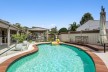 Sundrenched Pool, Dual Living, ¼ Acre Plus Additional Income source!!!