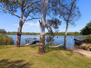 Absolute Creekfront Living with Private Boat Ramp & Pontoon Access | Rare Meldale Waterfront Holding
